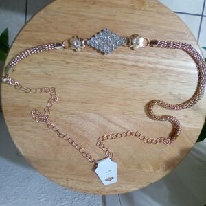 Diamond shaped with diamonds on each side belt